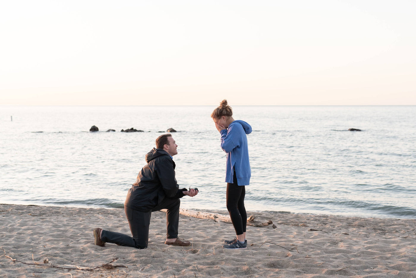 Carson Proposes to Michelle on the Beach with an Engagement Ring from Henne Jewelers