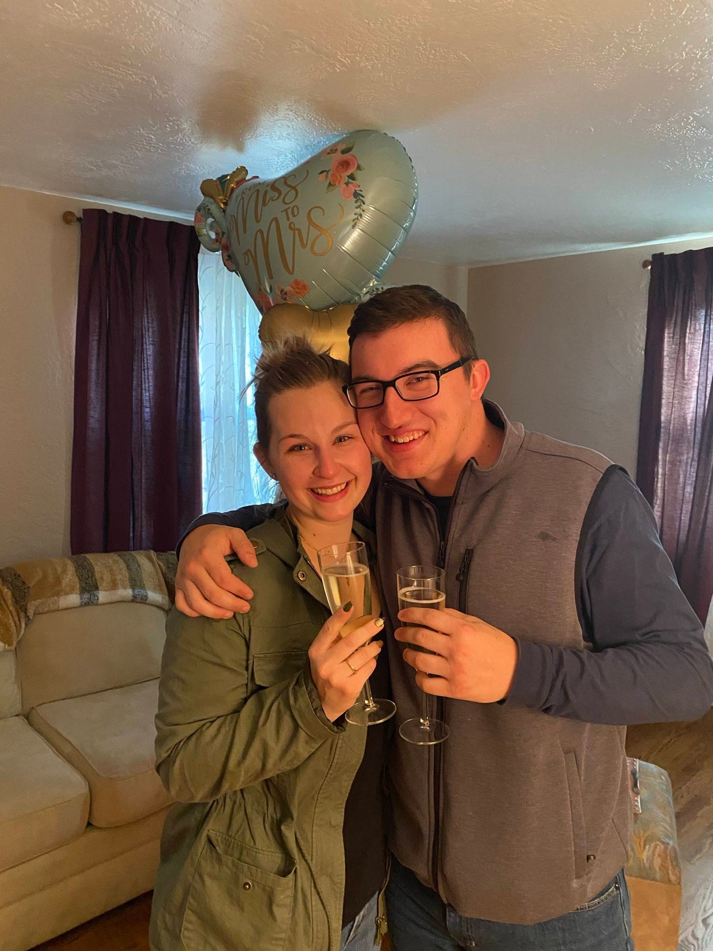 Henne Engagement Ring Couple Kristofer and Stephanie Celebrate Their Engagement with Champagne