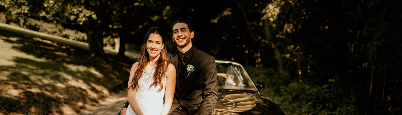 Henne Engagement Ring Couple Rocco and Sarah in Front of Sports Car on Their Wedding Day