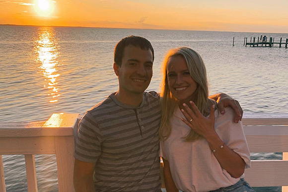 Gabe & Leah at Sunset Showing off Leah's Engagement Ring from Henne Jewelers
