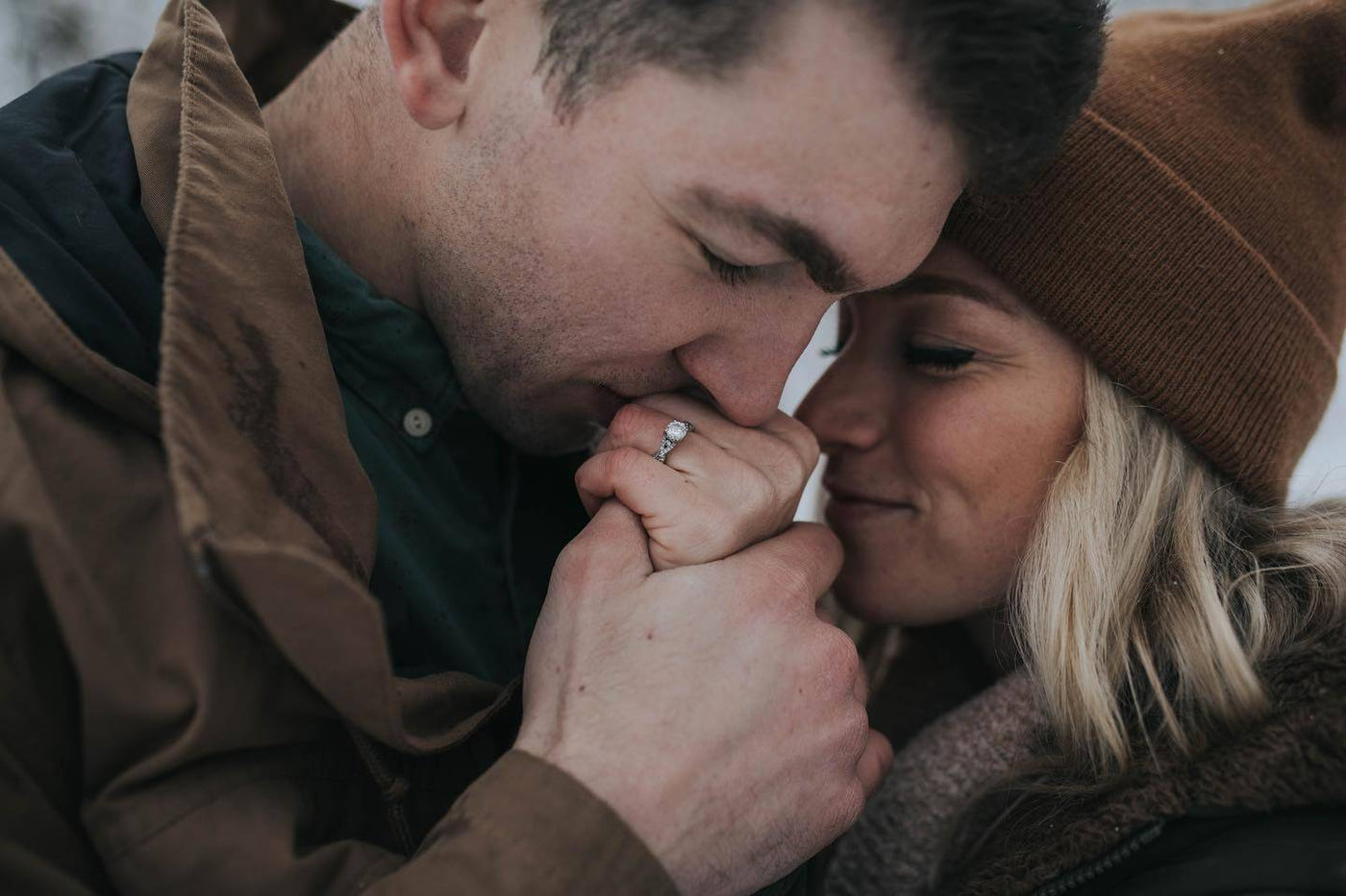 Matt Kisses Montana's Hand Showing Off Engagement Ring from Henne Jewelers