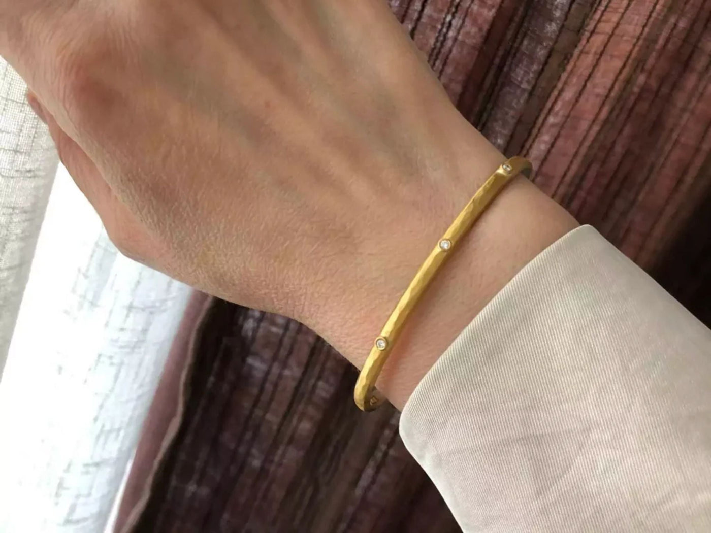 Lika Behar yellow gold bangle with diamonds