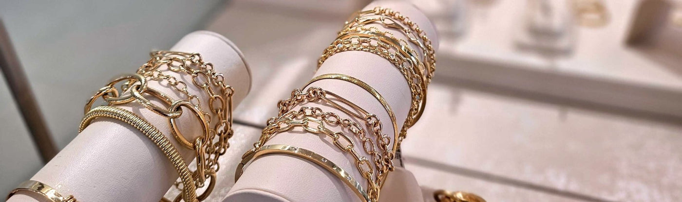 yellow gold bracelets in jewelry case