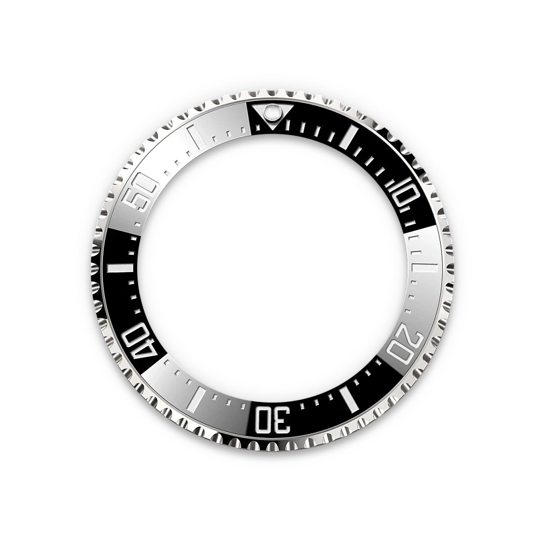Silver and black rotating bezel with minute markings typically used on a luxury watch, designed with a triangular marker at the 12 o'clock position.