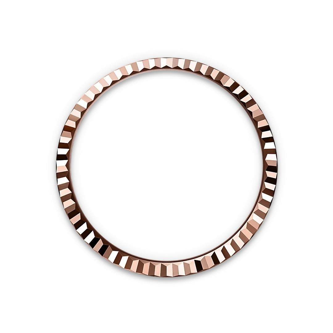 Rose gold circular bezel with a faceted, geometric design on a black background, highlighting fine craftsmanship and elegant detail.