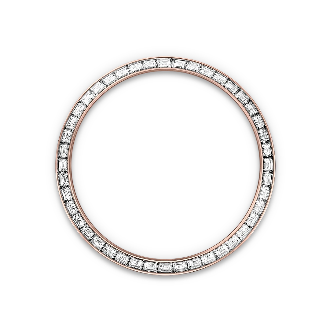 Rose gold ring bezel set with a continuous row of rectangular clear diamonds, shown against a black background for detail and clarity.
