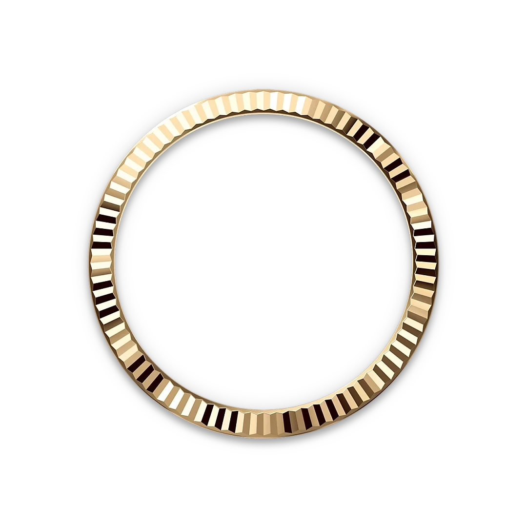 Gold bezel ring with a detailed ridged texture, displayed against a black background, highlighting its polished luxury jewelry design.