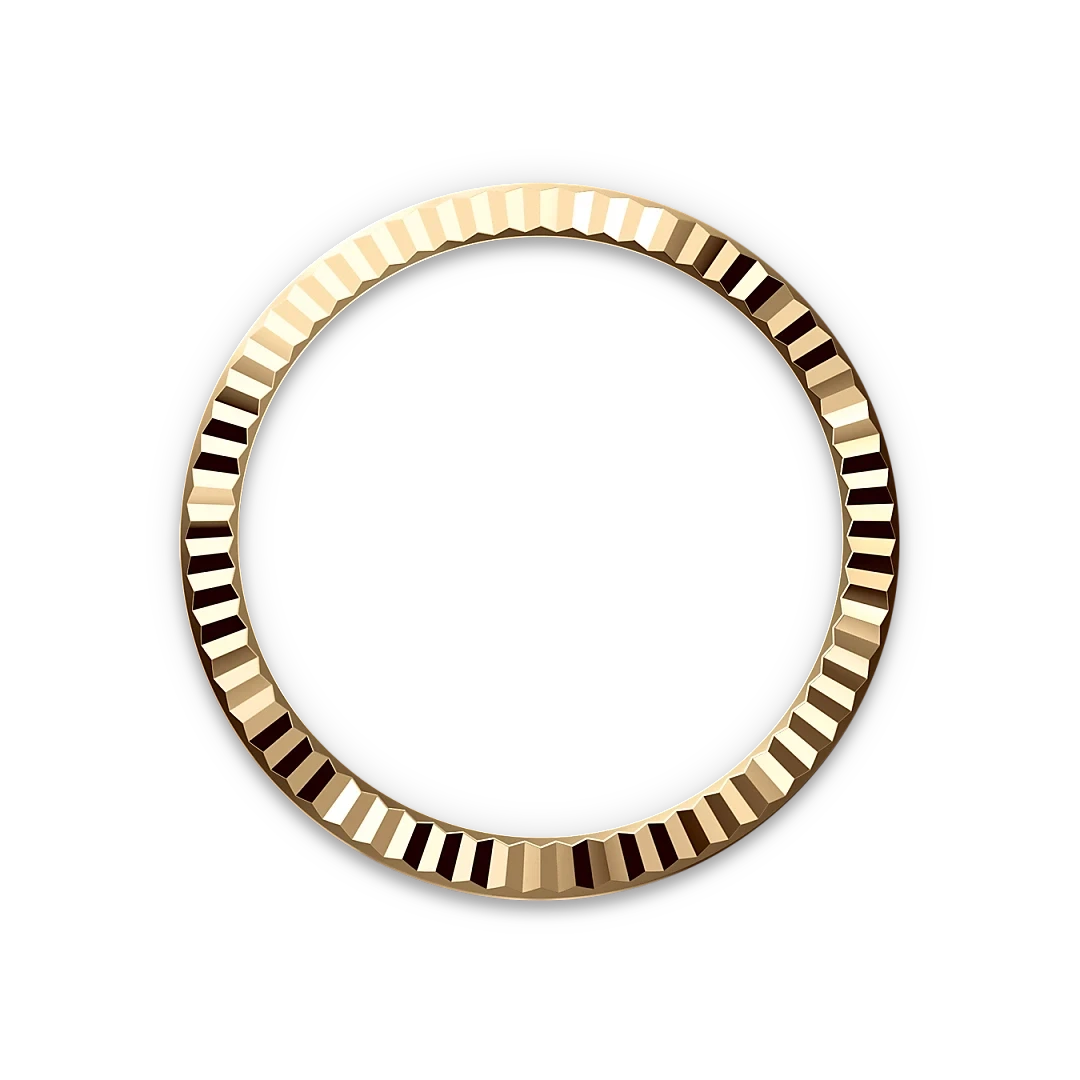 Shiny gold bezel with a ridged texture displayed against a black background, highlighting the detail and luxury craftsmanship typical of fine jewelry elements.