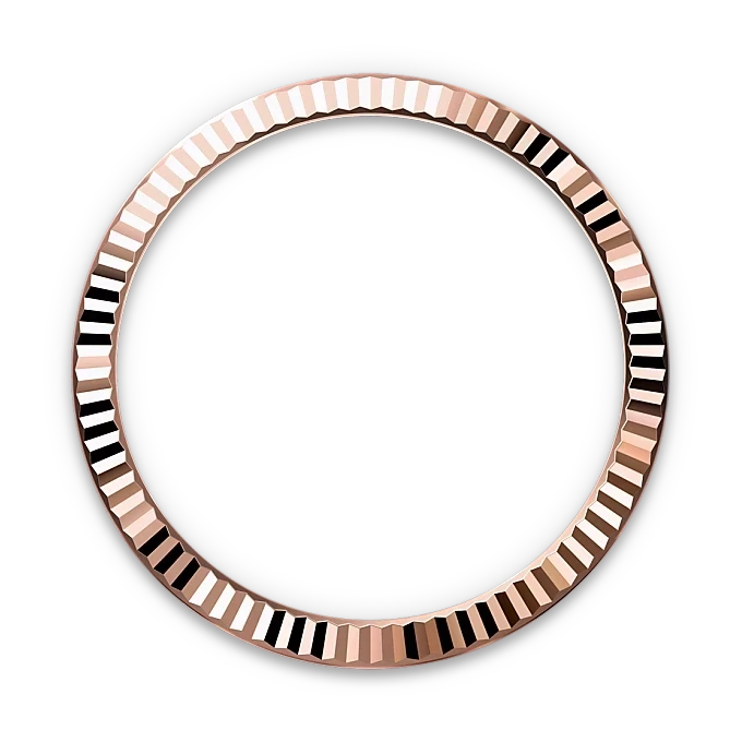 Rose gold circular bezel with a faceted, reflective surface displayed on a black background, showcasing fine craftsmanship and luxury jewelry design.