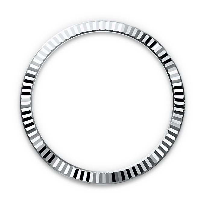 Close-up of a polished, fluted silver bezel ring against a black background, highlighting its reflective facets and elegant design.
