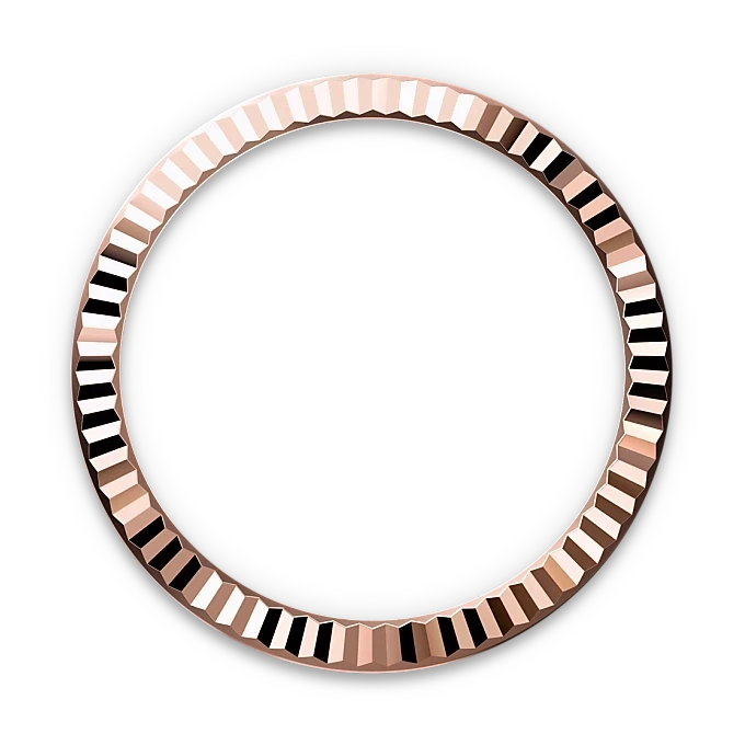 Close-up of a rose gold fluted bezel ring with a polished faceted surface, highlighting luxury jewelry craftsmanship by a family-owned jeweler committed to exceptional customer service.