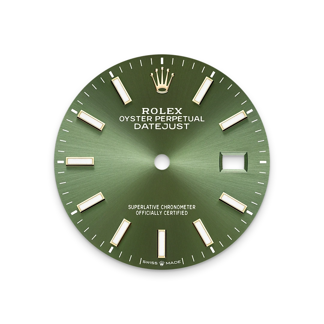 Green Rolex Oyster Perpetual Datejust watch dial with gold hour markers, brand logo, and date window, showcasing fine craftsmanship and luxury watch detail.