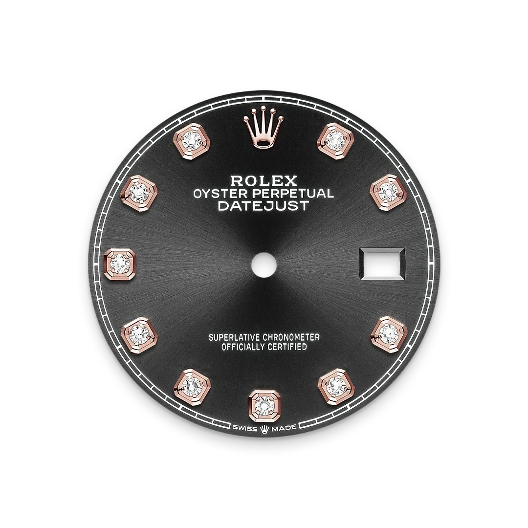 Close-up of a Rolex Oyster Perpetual Datejust watch dial in black with rose gold diamond hour markers, the Rolex crown logo at 12 o’clock, and a date window at 3 o’clock.