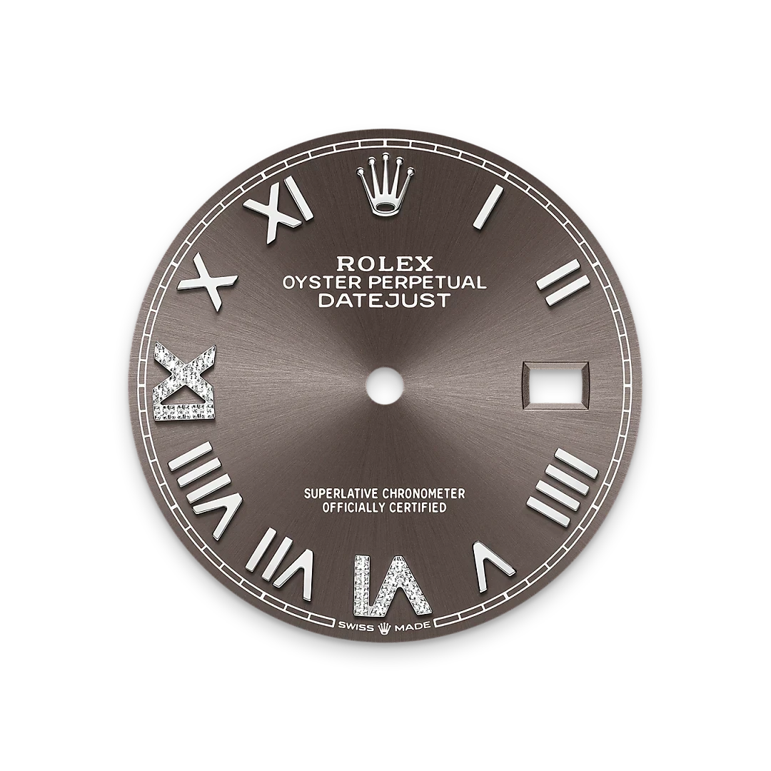 Close-up of a brown Rolex Datejust watch face with silver Roman numerals, diamond accents on IX and VI, a date window, and the Rolex crown logo at the top.