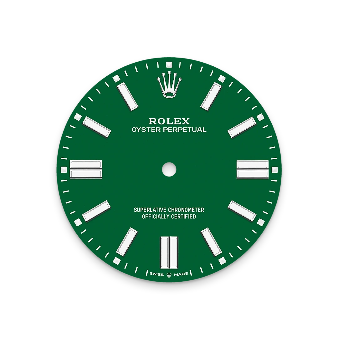 Green Rolex Oyster Perpetual watch dial with white hour markers, Rolex crown logo at 12 o'clock, and text indicating superlative chronometer certification and Swiss made origin.