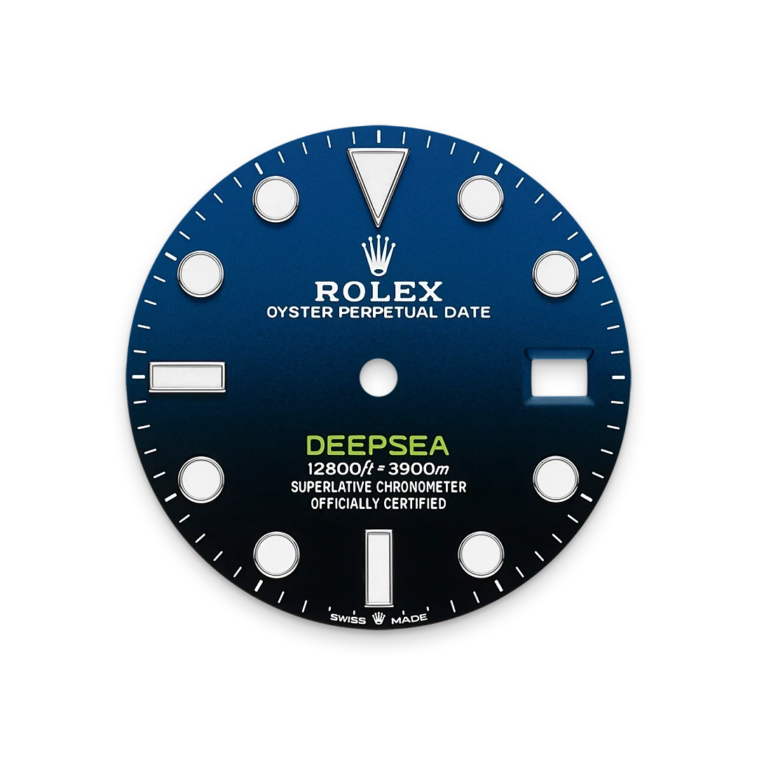 Close-up of a deep blue Rolex Deepsea watch face with white hour markers, the brand logo, and text indicating water resistance to 3900 meters and official chronometer certification.