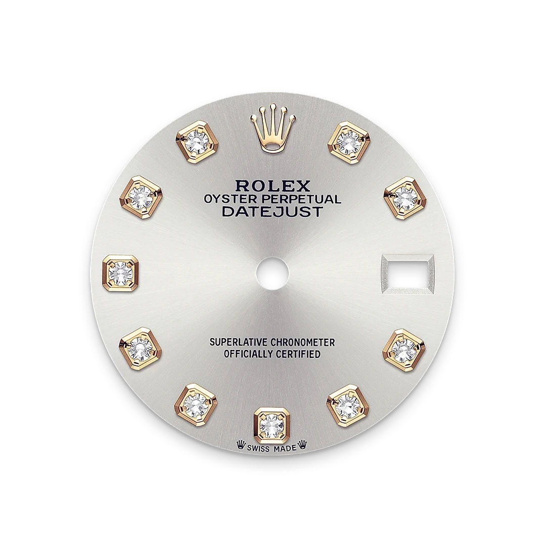 Close-up of a Rolex Oyster Perpetual Datejust watch dial featuring diamond hour markers set in gold, a silver sunburst finish, and text indicating its chronometer certification and Swiss origin.