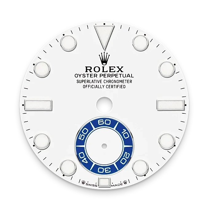 Close-up of a white Rolex Oyster Perpetual watch dial featuring the brand logo, text indicating superlative chronometer certification, luminous hour markers, and a blue and white subdial for seconds.