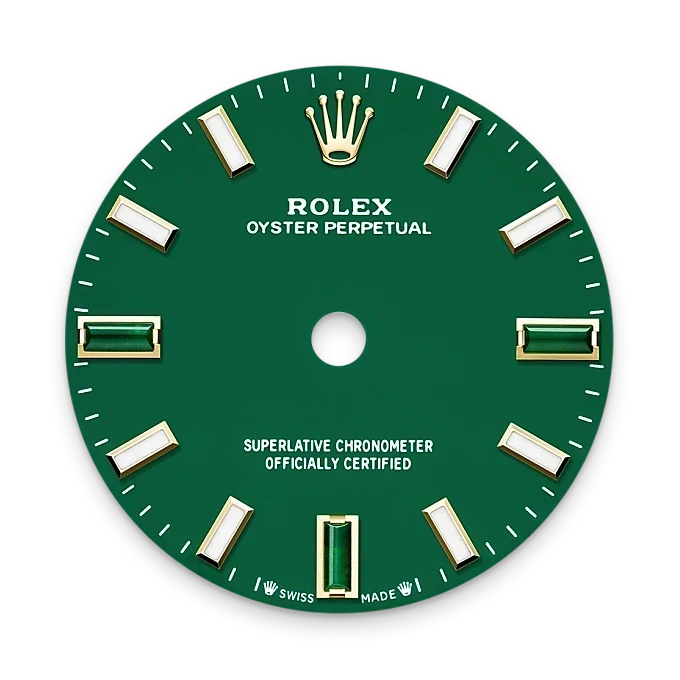 Green Rolex Oyster Perpetual watch dial with gold and white hour markers, featuring the Rolex crown logo and text indicating certified chronometer status.