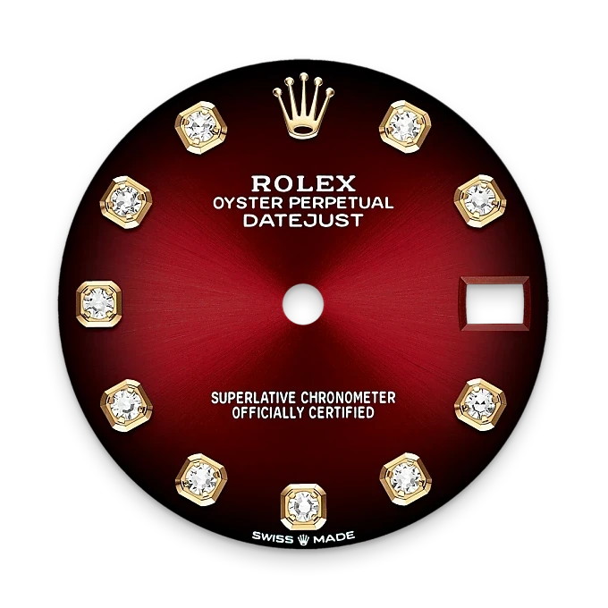 Close-up of a red Rolex Oyster Perpetual Datejust watch dial featuring gold and diamond hour markers, the Rolex crown logo, and text highlighting its certified chronometer status.