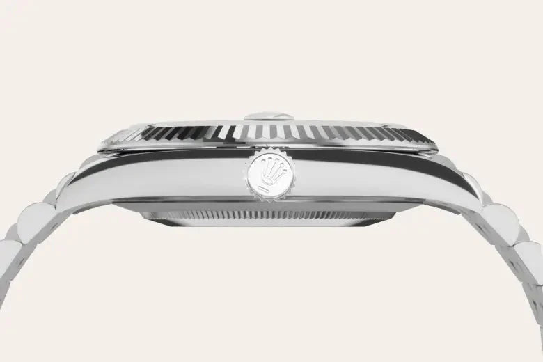 Close-up side view of a luxury Rolex watch featuring a polished stainless steel case and crown with the Rolex logo, highlighting fine craftsmanship and design.