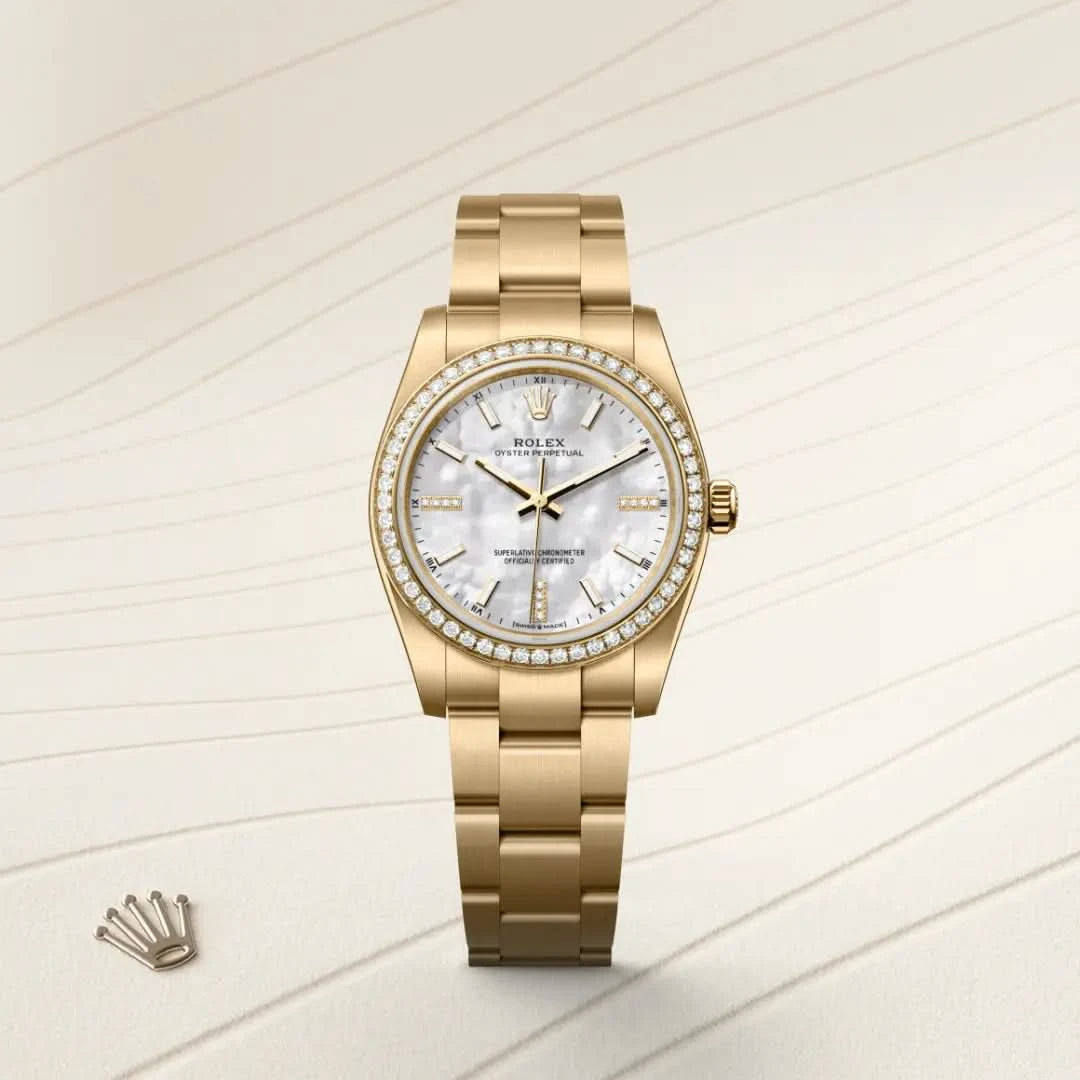 rolex oyster perpetual in 18 ct yellow gold, M124248RBR-0001 - henne jewelers