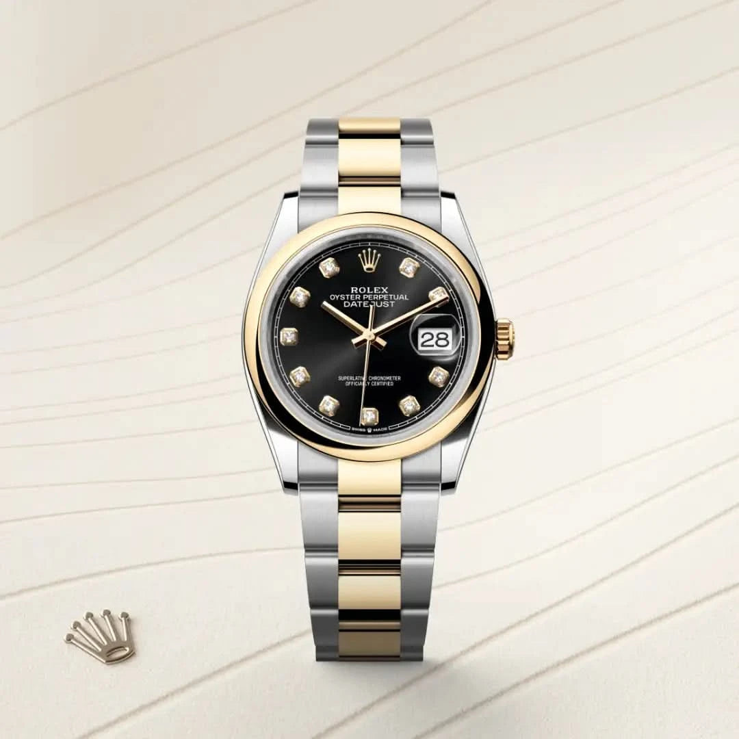 rolex datejust in yellow rolesor - combination of oystersteel and yellow gold, M126203-0022 - henne jewelers
