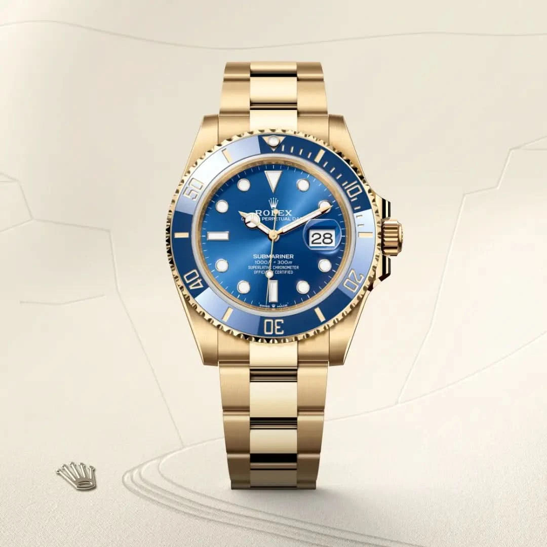 rolex submariner in 18 ct yellow gold, M126618LB-0002 - henne jewelers