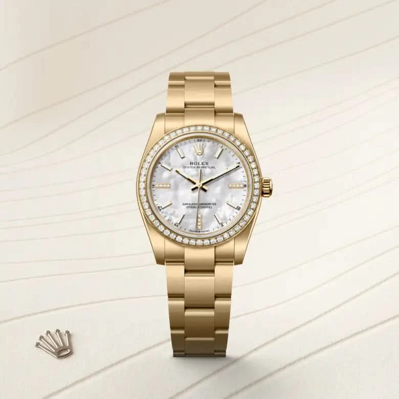 rolex oyster perpetual in 18 ct yellow gold, M124248RBR-0001 - henne jewelers
