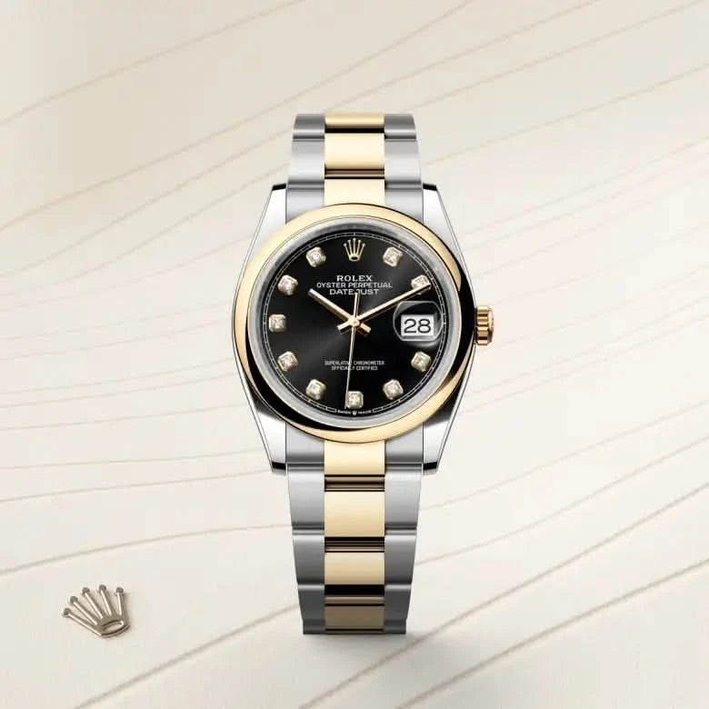 rolex datejust in yellow rolesor - combination of oystersteel and yellow gold, M126203-0022 - henne jewelers