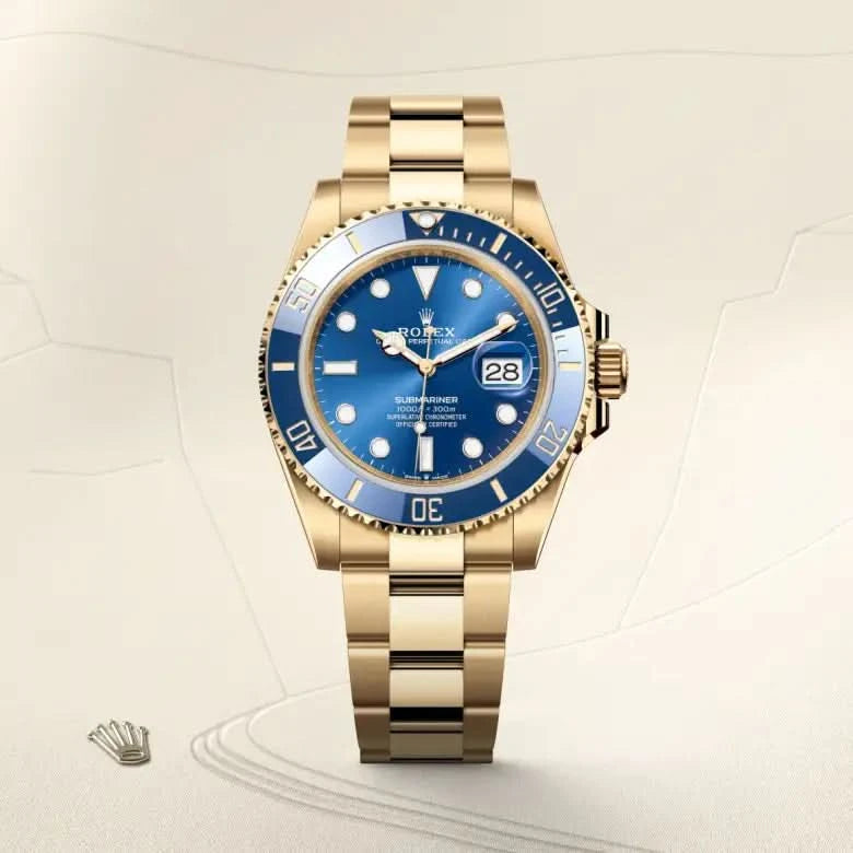 rolex submariner in 18 ct yellow gold, M126618LB-0002 - henne jewelers