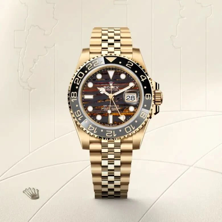 rolex gmt-master ii in 18 ct yellow gold, M126718GRNR-0002 - henne jewelers
