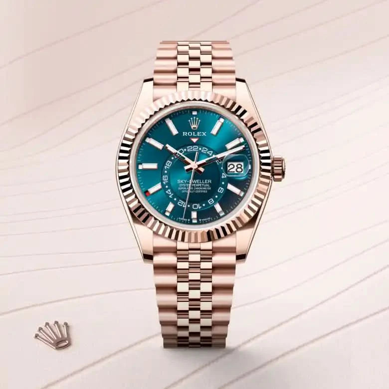 rolex sky-dweller in 18 ct everose gold, M336935-0005 - henne jewelers