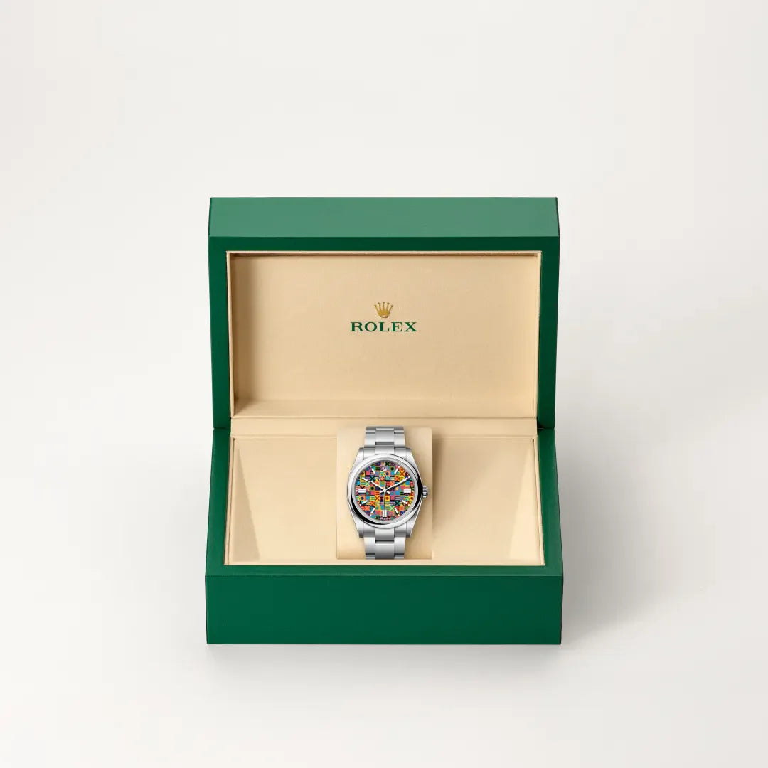 rolex Oyster Perpetual in Oystersteel, M126000-0016 - Henne Jewelers