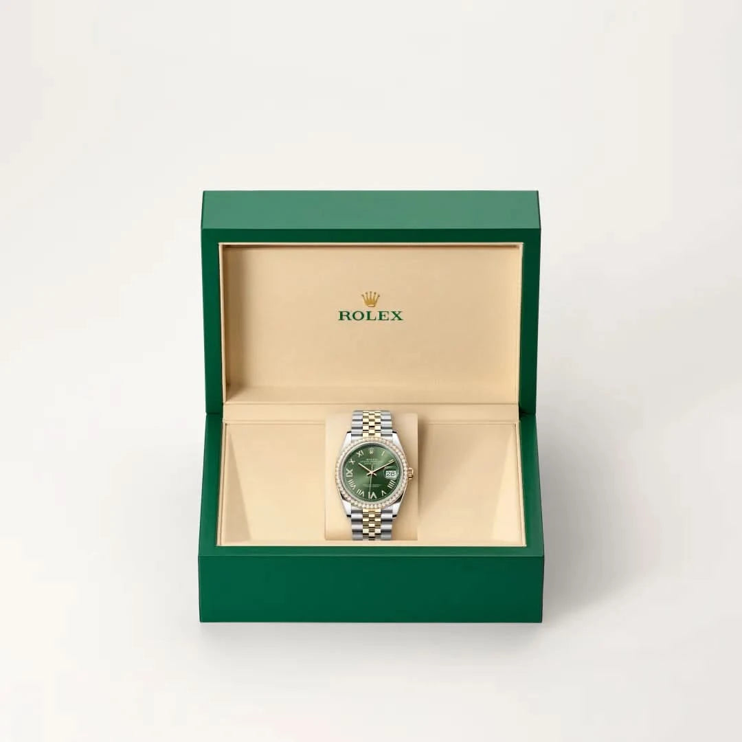 rolex datejust in yellow rolesor - combination of oystersteel and yellow gold, M126283RBR-0035 - henne jewelers