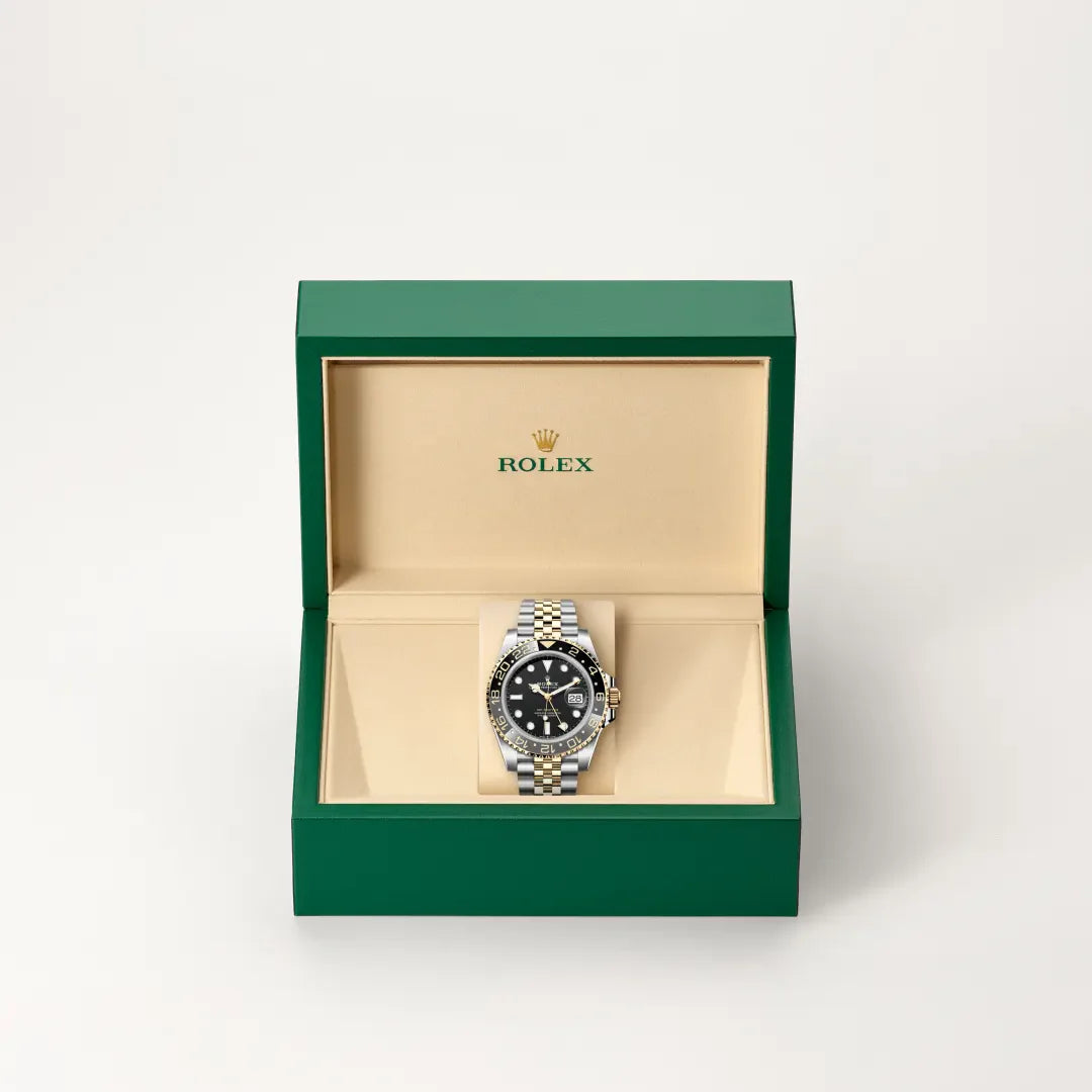 rolex GMT-Master II in Yellow Rolesor - combination of Oystersteel and yellow gold, M126713GRNR-0001 - Henne Jewelers