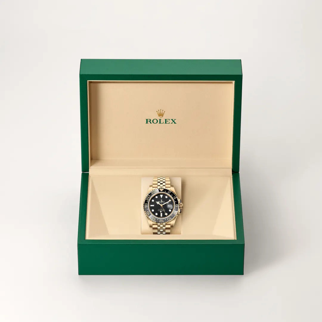 rolex GMT-Master II in 18 kt yellow gold, M126718GRNR-0001 - Henne Jewelers
