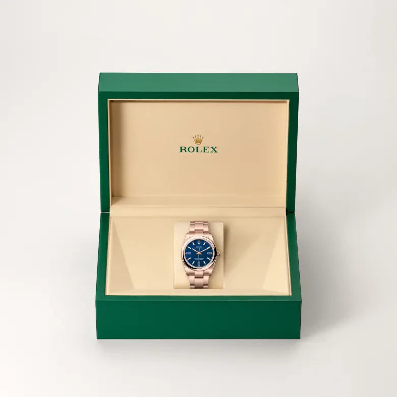 rolex Oyster Perpetual in 18 kt Everose gold, M124205-0002 - Henne Jewelers