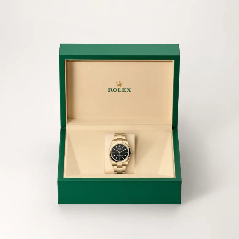 rolex Oyster Perpetual in 18 kt yellow gold, M124208-0001 - Henne Jewelers
