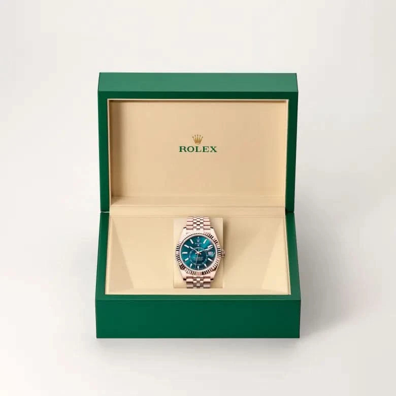 rolex sky-dweller in 18 ct everose gold, M336935-0005 - henne jewelers