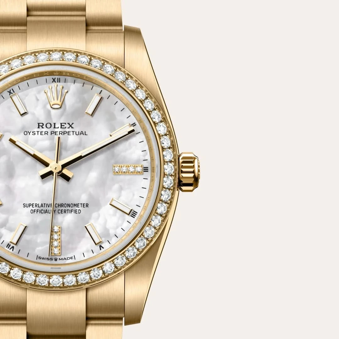 rolex oyster perpetual in 18 ct yellow gold, M124248RBR-0001 - henne jewelers