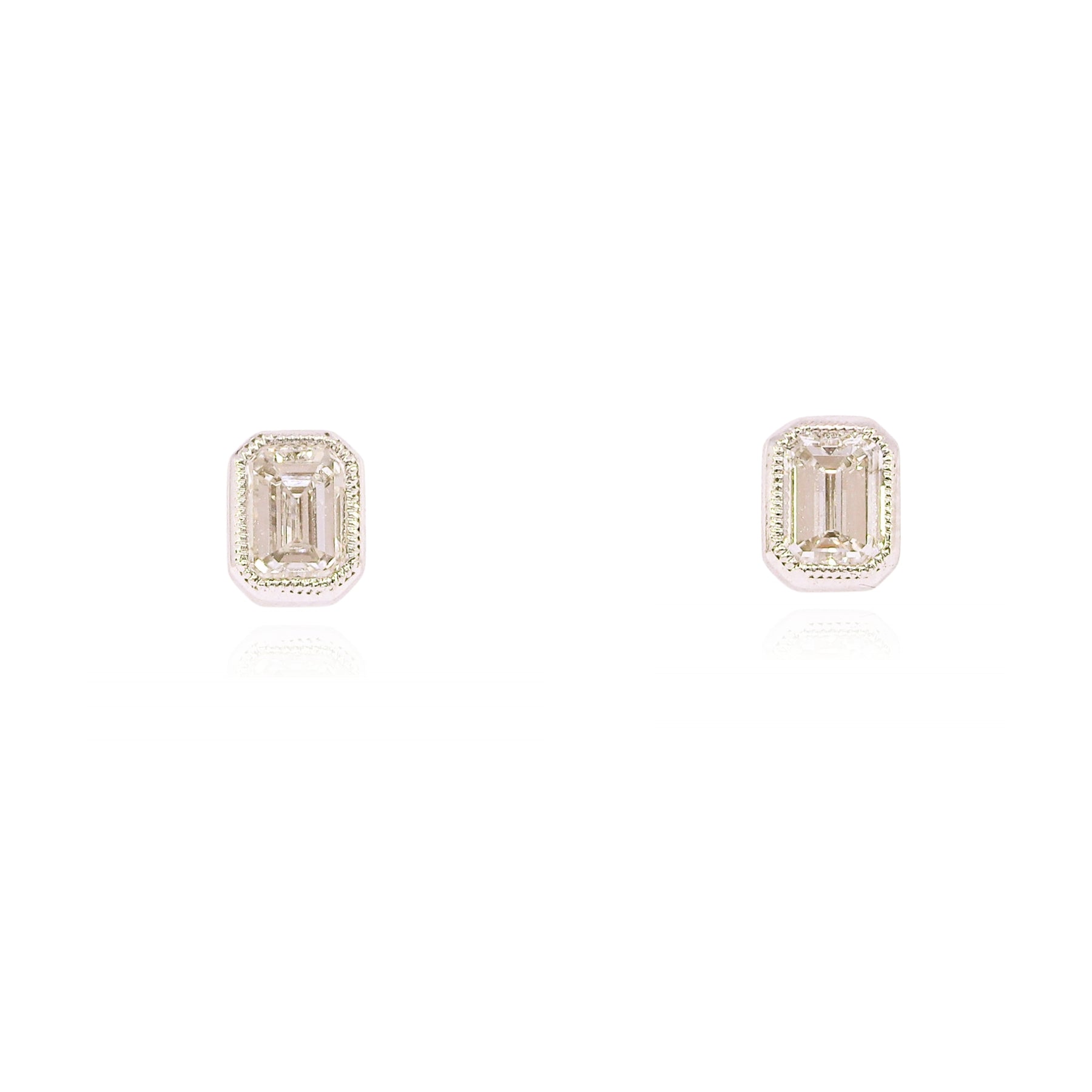 18K WHITE GOLD EMERALD-CUT DIAMOND STUD EARRINGS - 0.63CTW