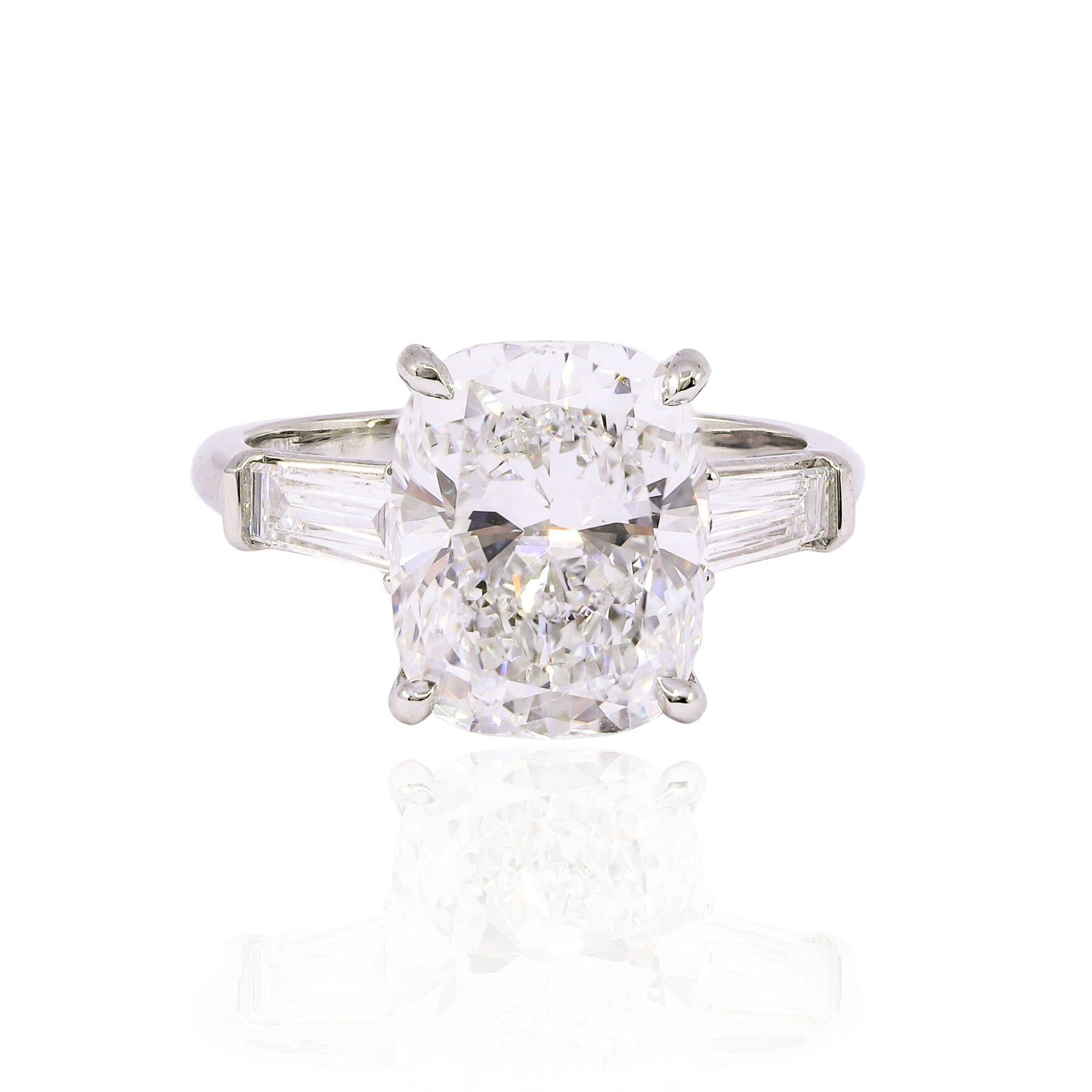 PLATINUM 5.20CT CUSHION-CUT DIAMOND THREE-STONE ENGAGEMENT RING