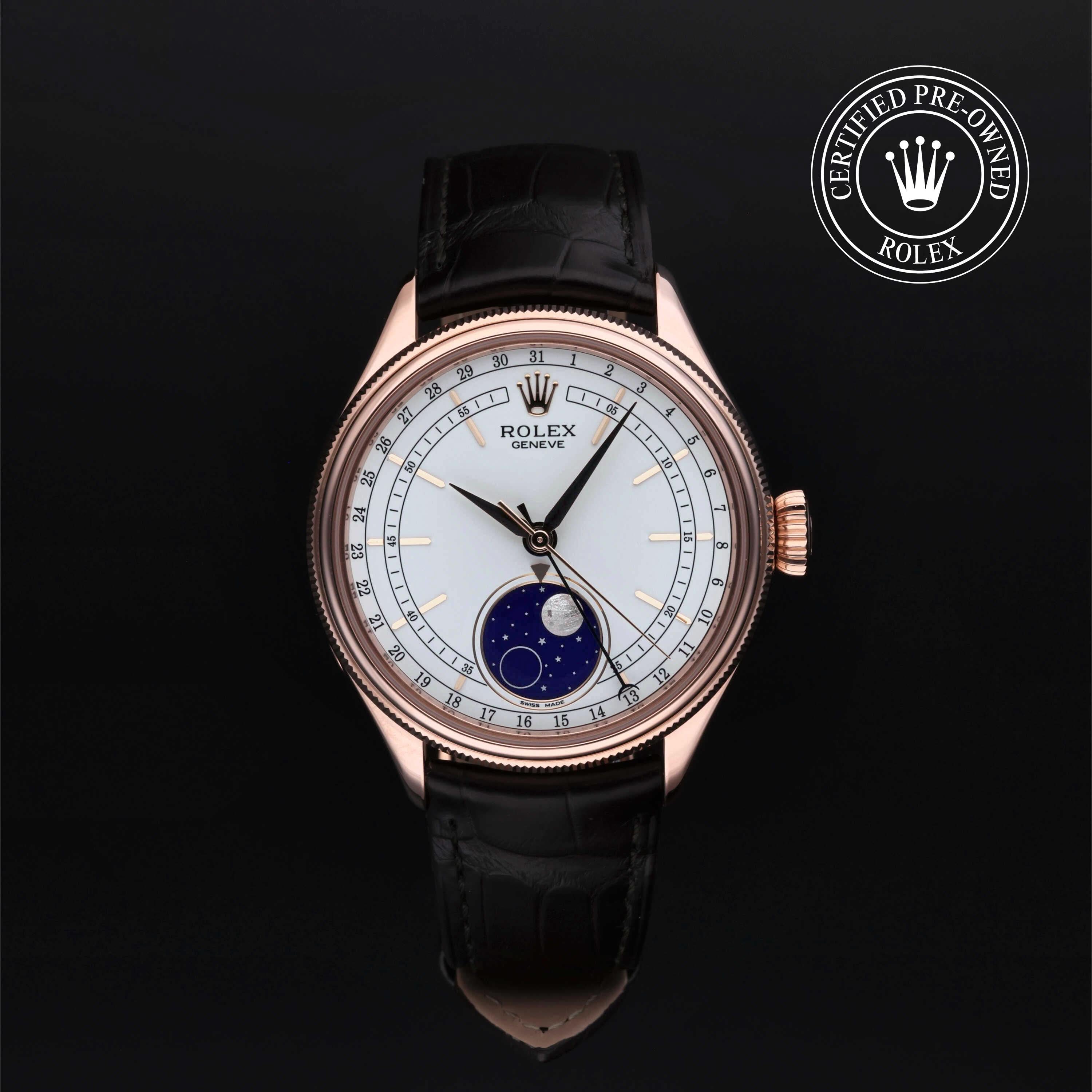 Cellini Moonphase luxury watch with rose gold case, white dial featuring moonphase complication, black leather strap, certified pre-owned Rolex by a family-owned jeweler.