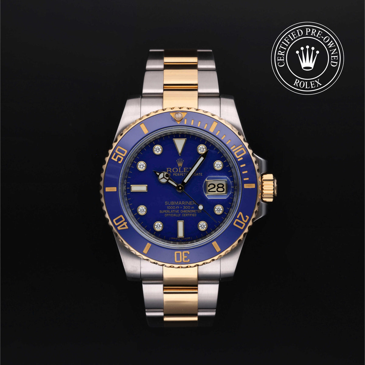 Submariner Date luxury watch with blue dial and gold accents, featuring Rolex Certified Pre-Owned seal, offered by a family-owned luxury jeweler with exceptional customer service.