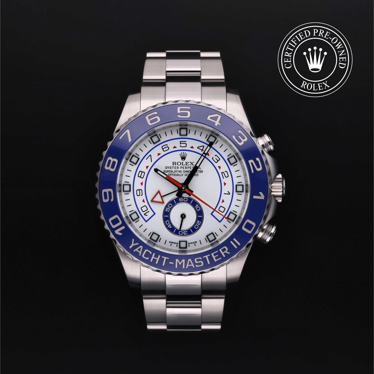 Rolex Yacht-Master II luxury watch with stainless steel bracelet and blue bezel, certified pre-owned, offered by a family-owned jeweler known for customer service and quality.