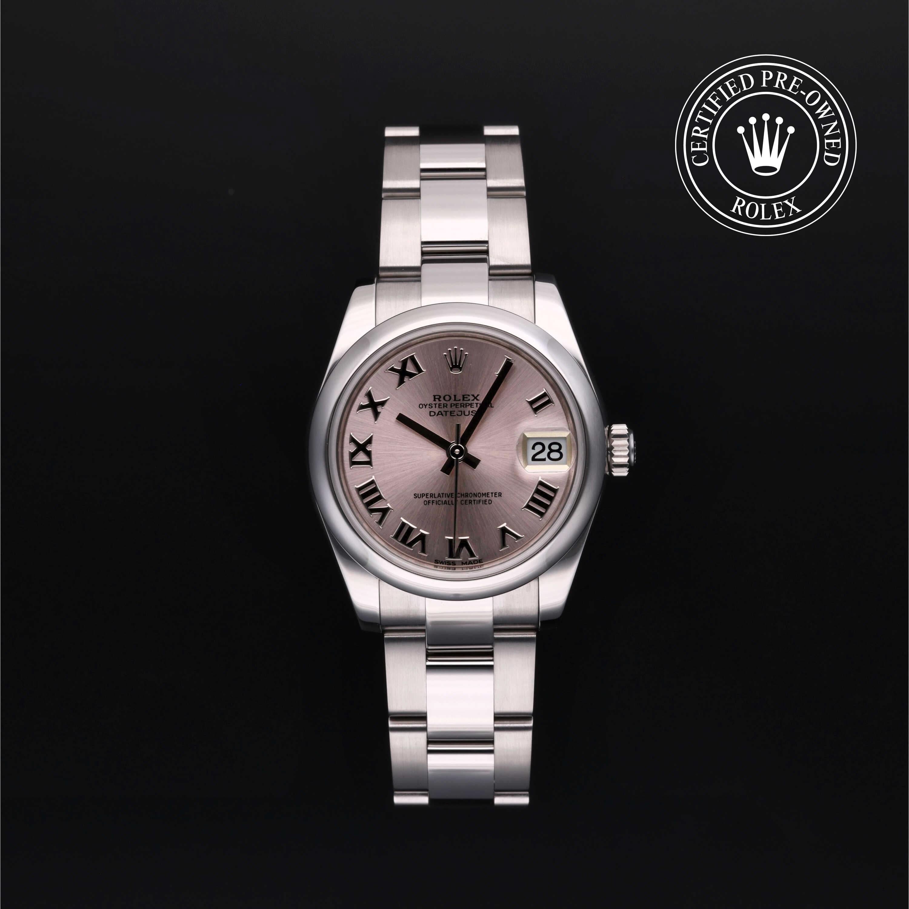 Datejust 31 Rolex Certified Pre-Owned luxury watch with silver stainless steel bracelet and pink dial featuring Roman numerals, offered by Henne Jewelers, Jewelers for Life.