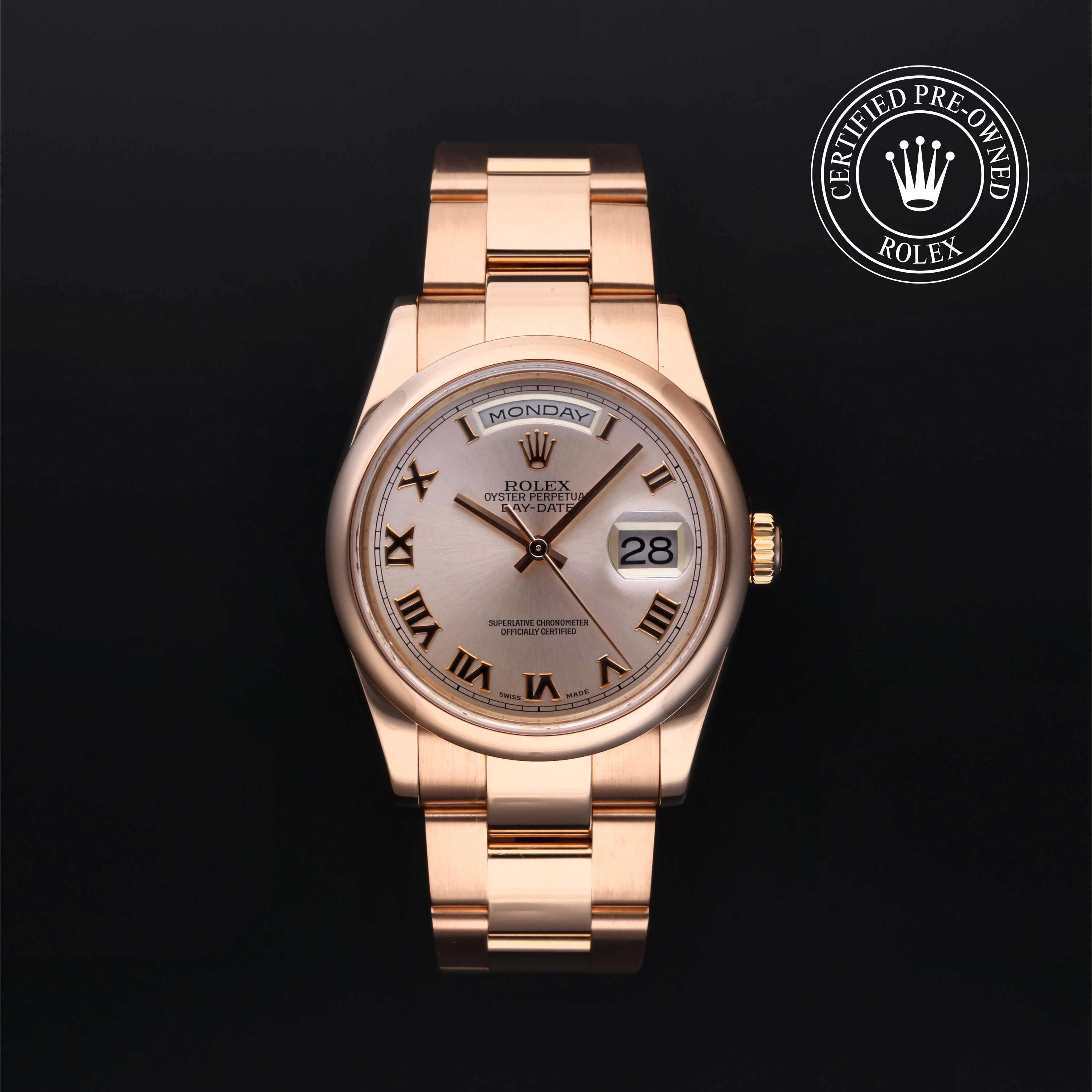 Day-Date 36 luxury watch in rose gold with Roman numeral dial, showcasing precision and elegance from a family-owned jeweler offering expert customer service. Jewelers for Life.