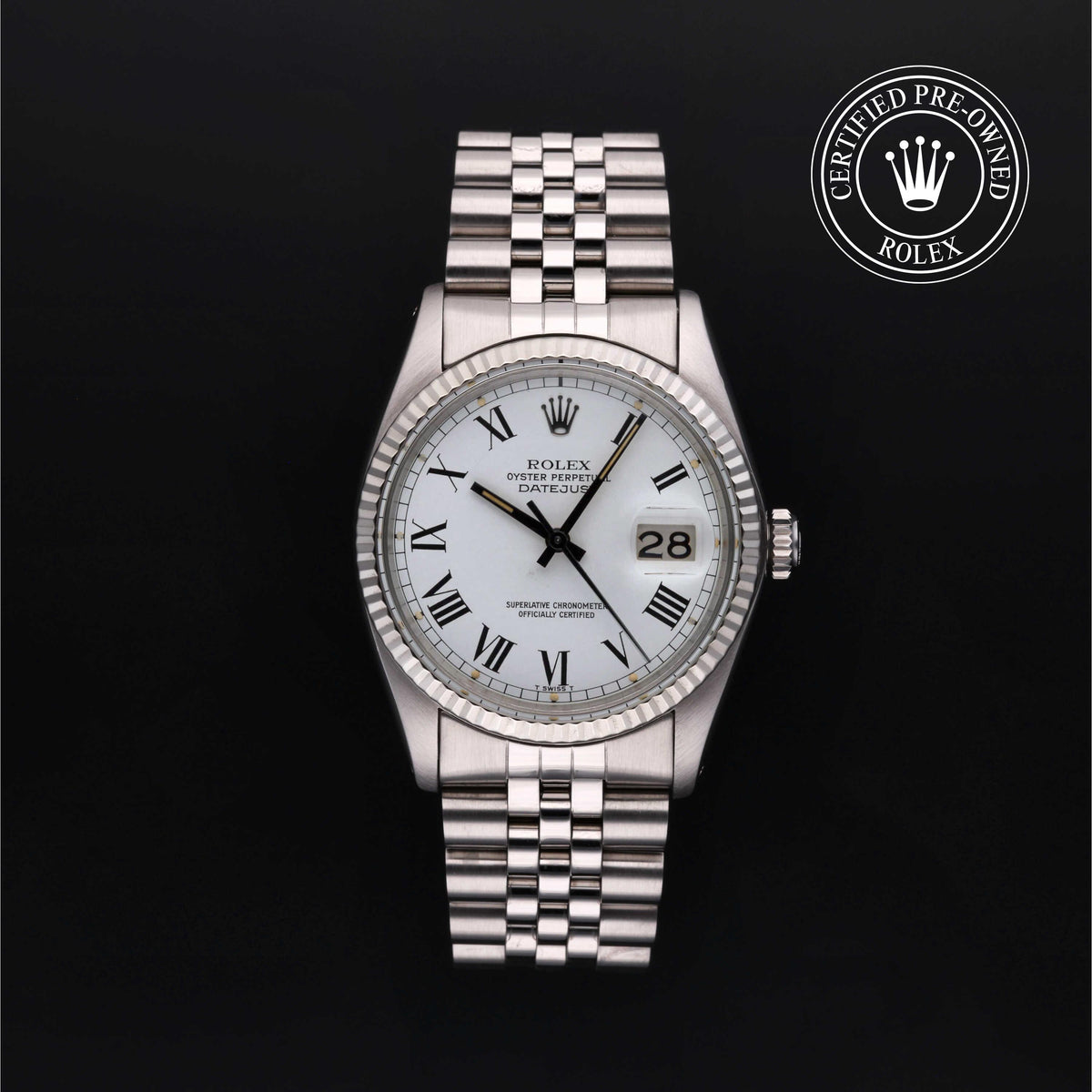 Rolex Datejust wristwatch with a silver stainless steel Oyster bracelet, fluted bezel, and white dial with black Roman numerals. A 'Certified Pre-Owned Rolex' badge is visible in the top right corner against a solid black background.