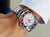 Close Up of Rolex GMT-Master II with Blue and Red Bezel, Meteorite Dial, and White Gold Band on Man's Wrist